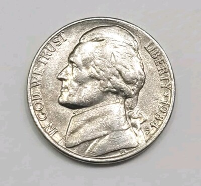 1984-P Jefferson nickel Doubled Die Obverse FS-101 showing Class IV offset hub doubling on Jefferson's eye and hairlines under magnification